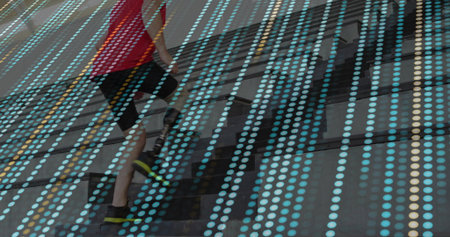 Climbing athlete wearing red shirt ascending in stairwell with glass panels and digital dot overlay....