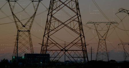 Dominating steel lattice tower standing with power lines above substation at dusk, binary overlay. Infrastructure, energy, technological, industrial, landscape, connectivity, digitalの写真素材
