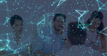 Collaborating team analyzing data in modern conference room with holographic network overlay. Technology, innovation, teamwork, analytics, digital, modern, businessの写真素材