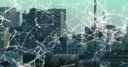 Displaying digital network overlay on outdoor urban cityscape with glowing nodes and white lines....