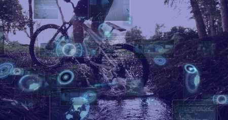 Adult male cyclist pedaling mountain bike through stream in forest clearing, with holographic data. Adventure, technology, eco, exploration, performance, outdoor, innovationの写真素材