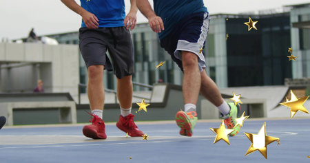 Running two basketball players in jerseys and sneakers on sports court with bench and gold stars....