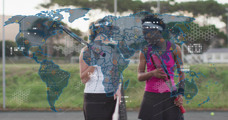Standing two tennis players resting rackets on shoulders on tennis court. Athletic, teamwork, fitness, outdoor, companionship, sportの写真素材