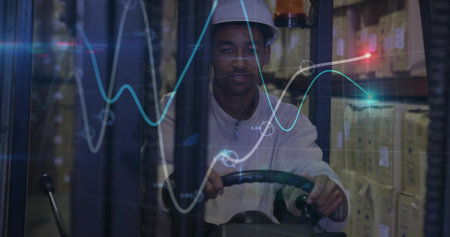 Forklift operator maneuvering controls among pallet racks of boxes in warehouse, with data overlay....