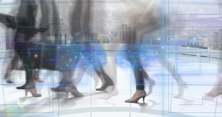 Blurred legs of professionals in suits striding across high rise lobby floor, with digital overlays. Corporate, technology, urban, futurism, networking, innovation, motionの写真素材