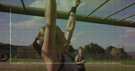 Hanging woman gripping wooden monkey bars on outdoor obstacle course under grid overlay, copy space. Fitness, outdoor, activity, sportive, training, agility, recreationの写真素材