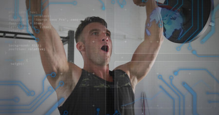 Muscular man in black tank top lifting plate under pull-up bar in gym, with digital overlay. Fitness, strength, technology, innovation, determination, wellnessの写真素材