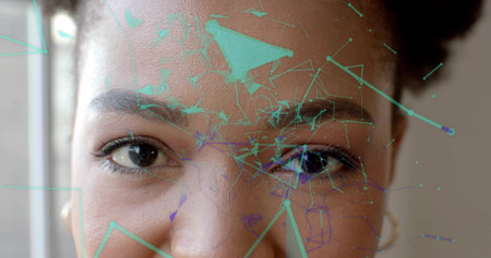 Staring creative woman showcasing digital network overlay on face by window, with gold earring. Futuristic, innovation, technology, portrait, wellness, connectivity, abstractの写真素材