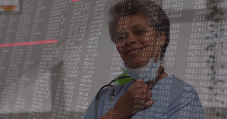 Holding mask under chin female nurse wearing stethoscope, displaying error code overlay in clinic. Technology, healthcare, telemedicine, digital, diagnostics, modern, professionalismの写真素材