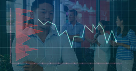 Posing Asian executive crossing arms in office, with pen smartphone tablet data overlay, copy space. Professional, teamwork, collaboration, analysis, finance, technology, modernの写真素材