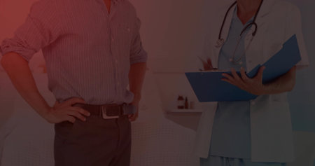 Discussing male patient health assessment in medical exam room, with stethoscope and clipboard. Clinical, professional, clean, minimalist, care, diagnosis, healthcareの写真素材