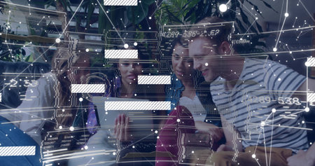 Collaborating team of four professionals analyzing tablet data in coworking lounge, with overlays. Collaboration, teamwork, digital, innovation, modern, startup, networkingの写真素材