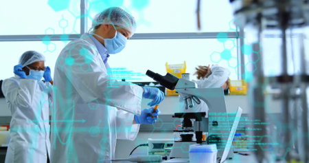 Pipetting scientist wearing lab coat mask gloves at lab bench, with pipette microscope copy space....