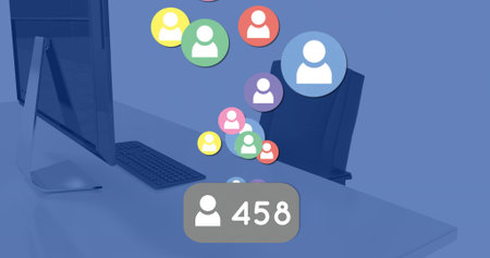 Displaying notification badge showing 458 user icons on office desk, with floating colored avatars....