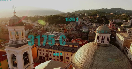 Showing cathedral dome beside bell tower over European rooftops, copy space. Historic, cityscape,...