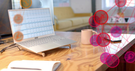 Displaying laptop showing spreadsheet on table in lounge area, with smartphone and network overlay. Workspace, technology, modern, digital, collaboration, networking, professionalの写真素材