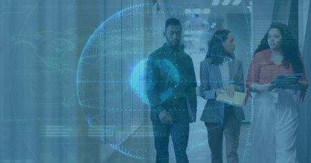 Walking three colleagues in suits examining holographic globe in office corridor with data overlays. Futuristic, innovation, collaboration, corporate, technology, data, networkingの写真素材