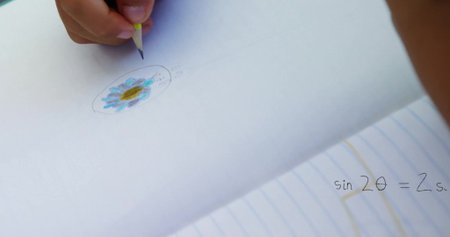 Gripping wooden pencil child hand sketching blue-petal flower doodle on paper, with sin2Î¸...