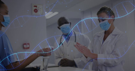 Medical team exchanging hand sanitizer in hospital corridor, wearing face masks, DNA helix graphics....