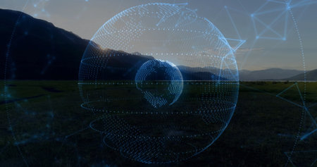 Floating digital holographic globe glowing above grassy plain at sunset, with network grid overlay. Futuristic, technology, innovation, data visualization, science, digital, landscapeの写真素材