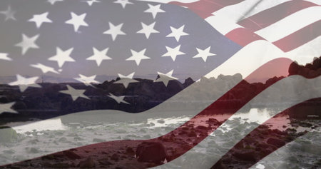 Featuring flag overlay across rocky shoreline, with scattered stones, shallow water pools. Patriotism, resilience, rugged, coastal, landscape, reflection, texturedの写真素材