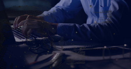 Typing IT professional wearing blue shirt working at home office desk, with laptop and data overlay. Technology, cybersecurity, data analytics, professional, workspace, digital, networkの写真素材