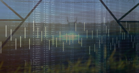 Showing composite landscape in field, with tall grass, metal tower, wind turbine and data overlay. Renewable, sustainability, eco-friendly, technology, finance, environment, modernの写真素材