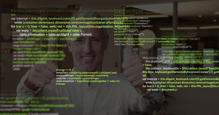 Standing mature developer smiling and holding thumbs up in office, overlaying HTML JavaScript code....