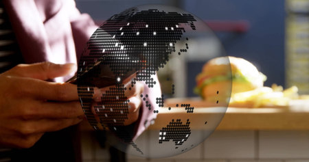 Man wearing blazer, using smartphone projecting dotted globe at cafe counter with burger and fries. Technology, networking, global connectivity, innovation, modern lifestyle, communication, digital deviceの写真素材
