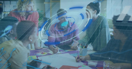 Brainstorming six colleagues leaning over table in office, with sketches, pens, holographic overlay. Collaboration, innovation, teamwork, data visualization, modern workspace, creative process, technologyの写真素材