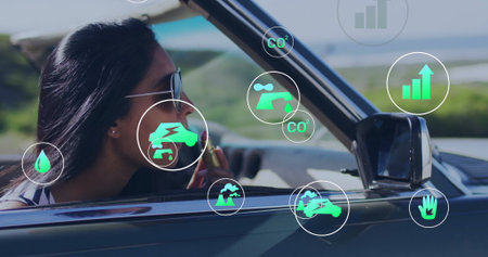 Applying lipstick woman in sunglasses in convertible on coastal road, floating icons, copy space....