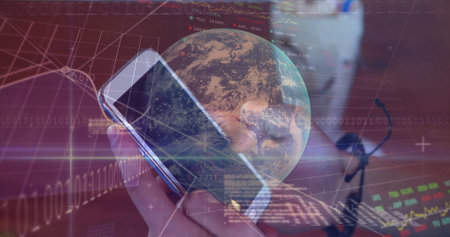 Person holding smartphone wearing headset in virtual space, viewing globe binary and finance charts. Technology, digital, data, analytics, futurism, communication, innovationの写真素材