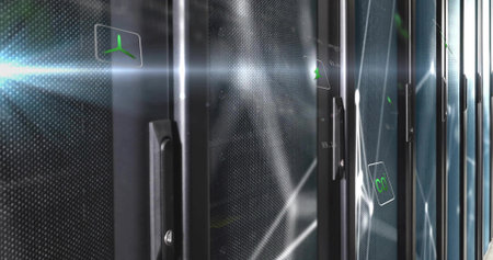Showing perforated cabinet door displaying digital green propeller icon in server room, copy space....