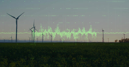 Showing cluster of wind turbines producing power at rural field, with data visualization overlay....