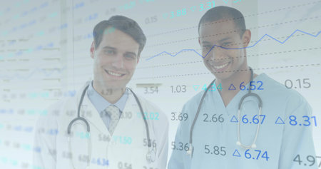 Analyzing line chart overlay, two medics standing in clinic, stethoscopes, lab coat and scrubs....