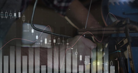 Plaid shirt woodworker sawing wood with coping saw at workbench. Craftsmanship, technology, productivity, innovation, precisionの写真素材