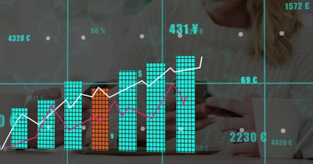 Floating bar and line charts above tablet at office desk, with stylus smartphone Â¥$â‚¬Â£...