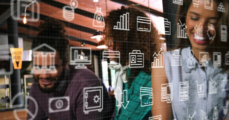 Analyzing three colleagues reviewing data icons overlay at modern office desk with wood beams. Collaboration, innovation, digital, business, teamwork, modern, productivityの写真素材