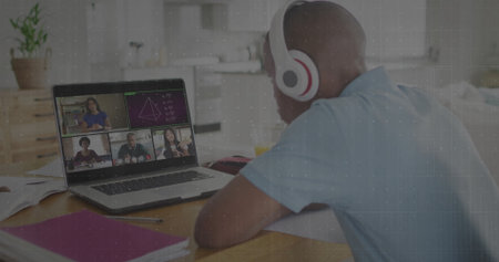 Teen student joining online class in kitchen with headphones laptop notebooks pen plant, copy space. Remote learning, virtual education, technology, modern, collaborative, lifestyle, connectivityの写真素材