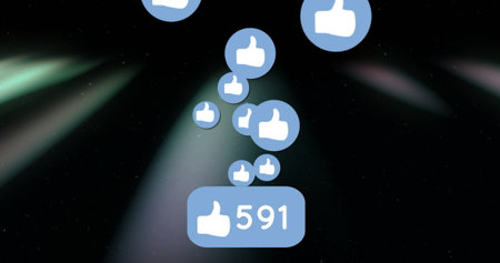 Floating cluster of thumbs-up icon bubbles rising on virtual interface backdrop, showing 591 likes. Digital, abstract, futuristic, social media, engagement, technology, vibrantの写真素材