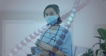 Holding tablet, female nurse with stethoscope examining DNA data in clinic, with DNA overlay. Medical, healthcare, clinical, science, technology, wellness, professionalismの写真素材