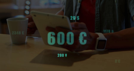 Holding tablet, man viewing floating currency graphics beside white mug and smartwatch at cafe. Technology, finance, communication, modern, concentration, workspace, casualの写真素材