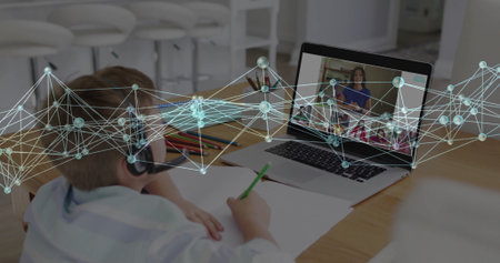Sitting boy in shirt and headset at kitchen table, learning with laptop and pencils under overlay....