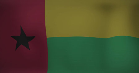 Waving fabric flag of Guinea-Bissau fluttering on fabric backdrop, showing gentle folds and shading. Patriotism, symbolism, national identity, textile, craftsmanship, cultural heritage, vibrantの写真素材