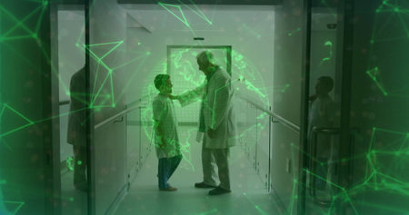 Standing doctor placing hand on boy shoulder in clinic corridor, projecting green digital globe....