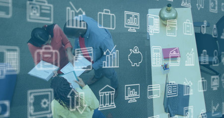 Reading reports, professionals pointing at figures in office with digital icons overlay, copy space. Business, teamwork, collaboration, data, analysis, innovation, modernの写真素材