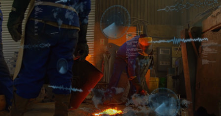 Metalworker bending and pouring molten metal at workshop floor, with crucible, copy space....