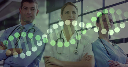 Standing three staff wearing scrubs and tie in medical lobby, with stethoscopes and DNA overlay....