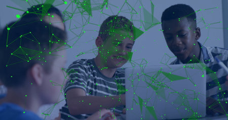 Collaborating teenage students pointing at laptop screen in classroom, with digital network overlay....