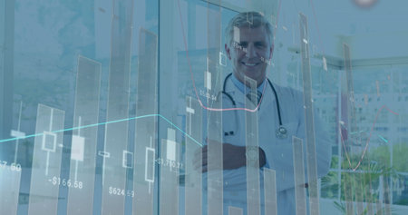 Standing doctor monitoring digital charts in clinic with windows wearing lab coat and stethoscope. Medical, analytics, healthcare, consulting, professional, modern, growthの写真素材